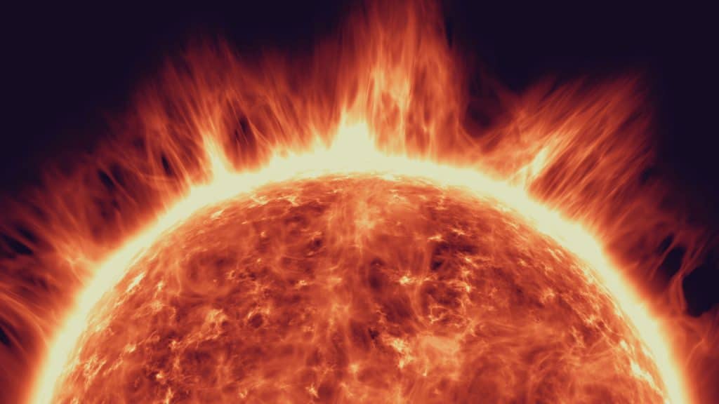 Imagem conceitual mostra uma explosão solar, com apenas o topo do sol visto na figura