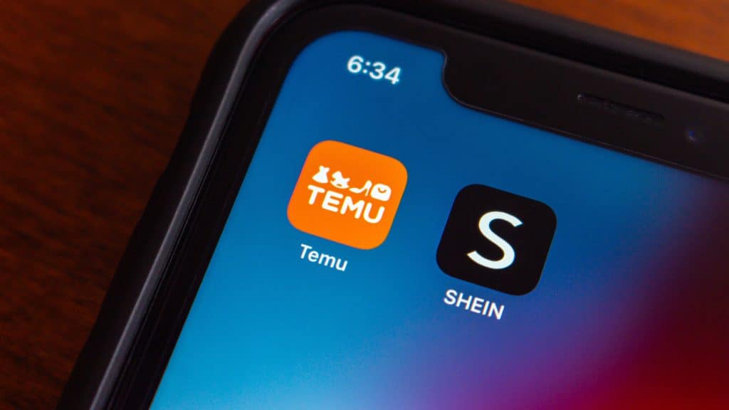 Ícones dos aplicativos da Temu e Shein em tela inicial de iPhone